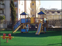 parco-giochi-prato-erba-sintetica